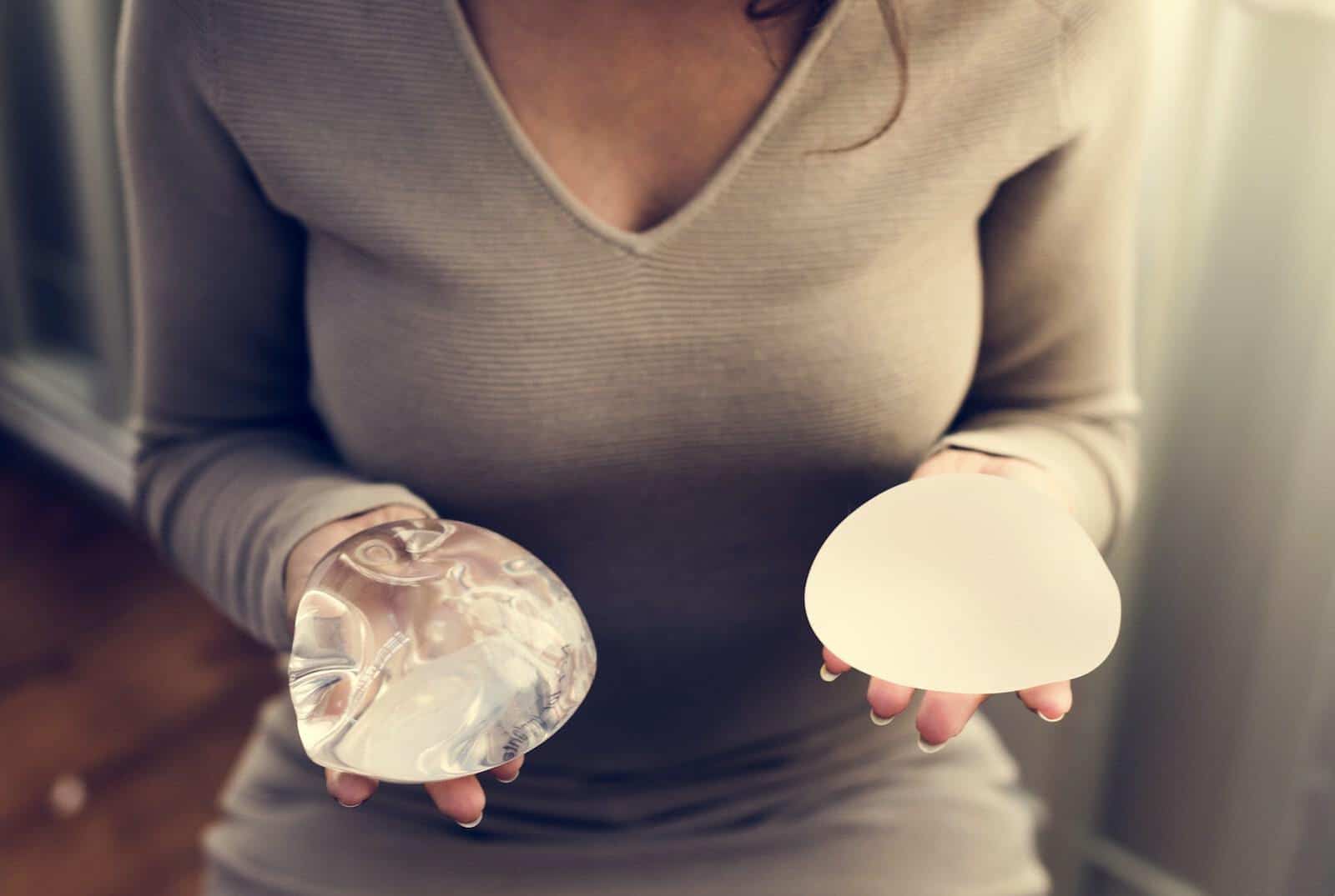 why do women get breast implants?